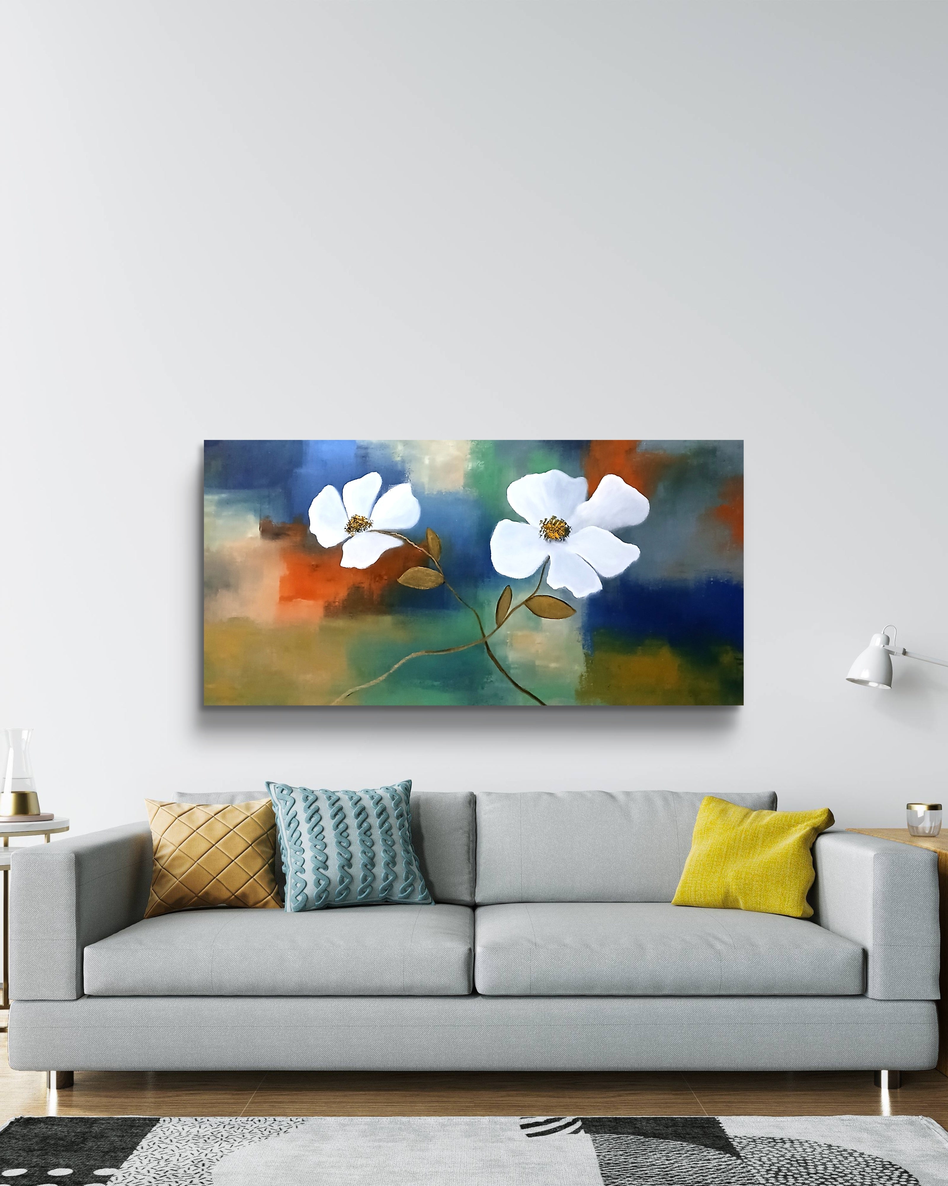 Two white flowers on an abstract colorful background